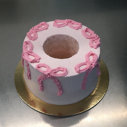 FROSTED BOW ANGEL CAKE