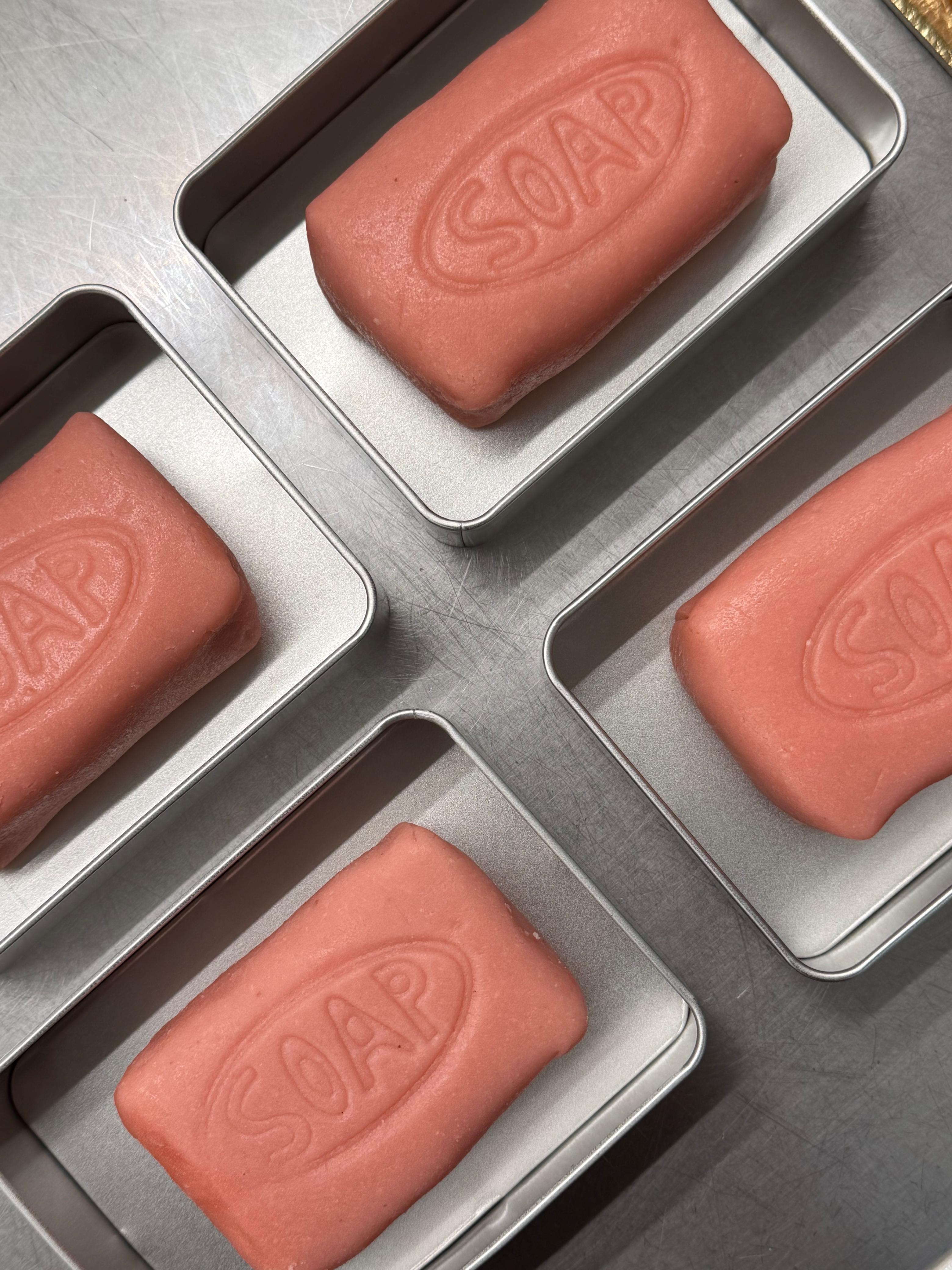 Custom soap-shaped cakes designed for Aalita's soap necklace launch during Milan Design Week